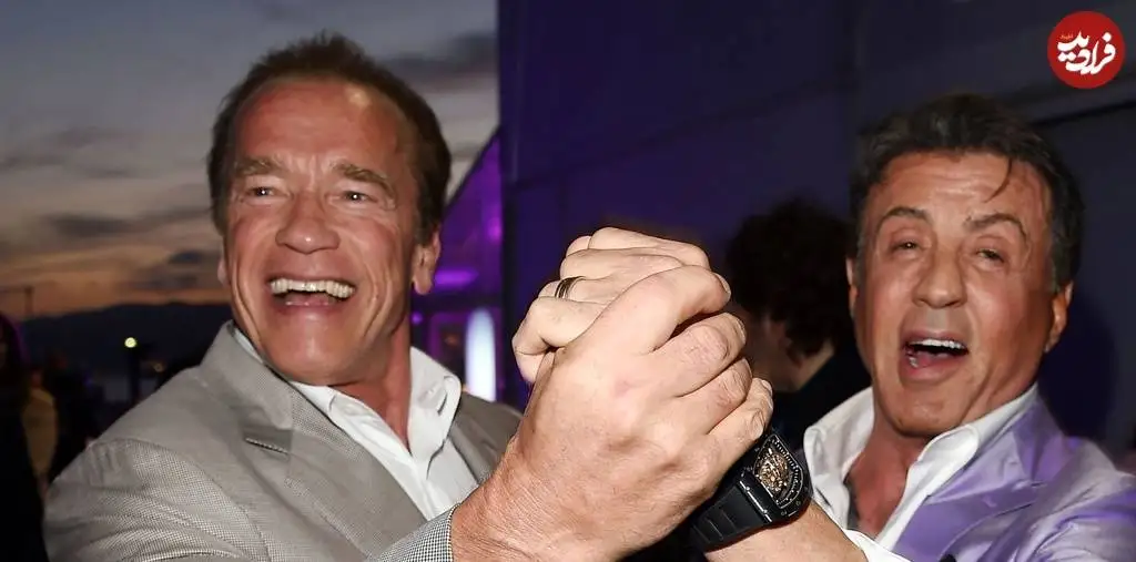 عکس؛ سفر در زمان؛ ژست صمیمی «آرنولد در کنار سیلوستر استالونه»؛ سال 1394