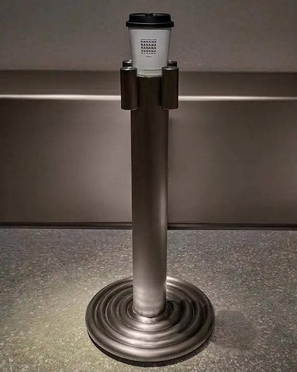 تصاویر؛ معماری یک کافه 60 متری با صفحات فولادی سقوط کرده 