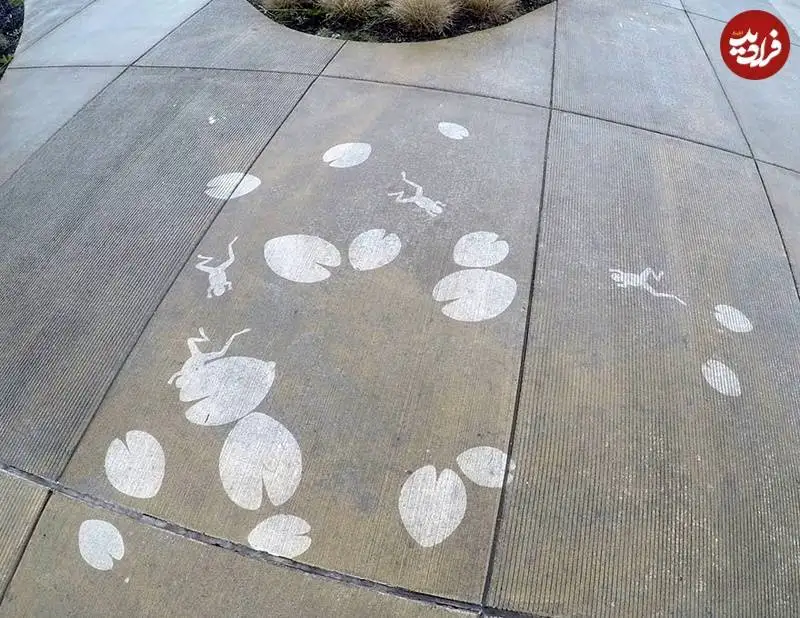 نقاشی های خلاقانه ای که فقط زیر باران دیده می شوند