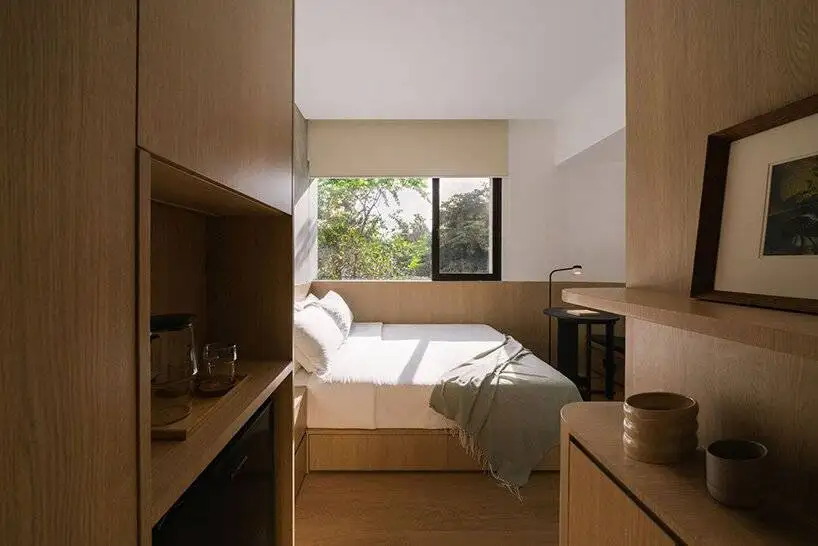 تصاویر؛ بازی انحناها در بتن: معماری فشرده آپارتمان های «ای بی سی» 