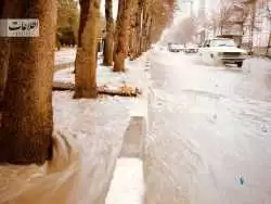 (عکس) سفر به تهران قدیم؛ بالا آمدن آب خیابان های تهران را بهم ریخت!