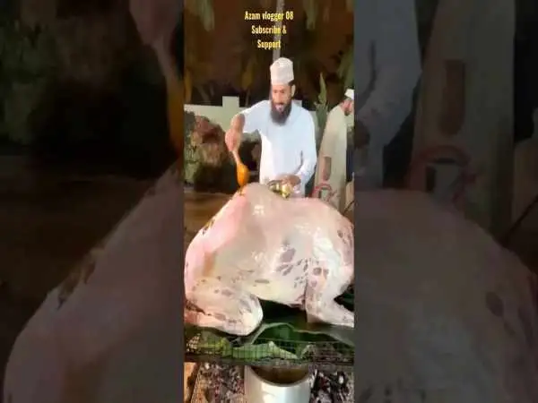 (ویدئو) فرآیند پخت بریانی با یک شتر کامل به روش عربی 